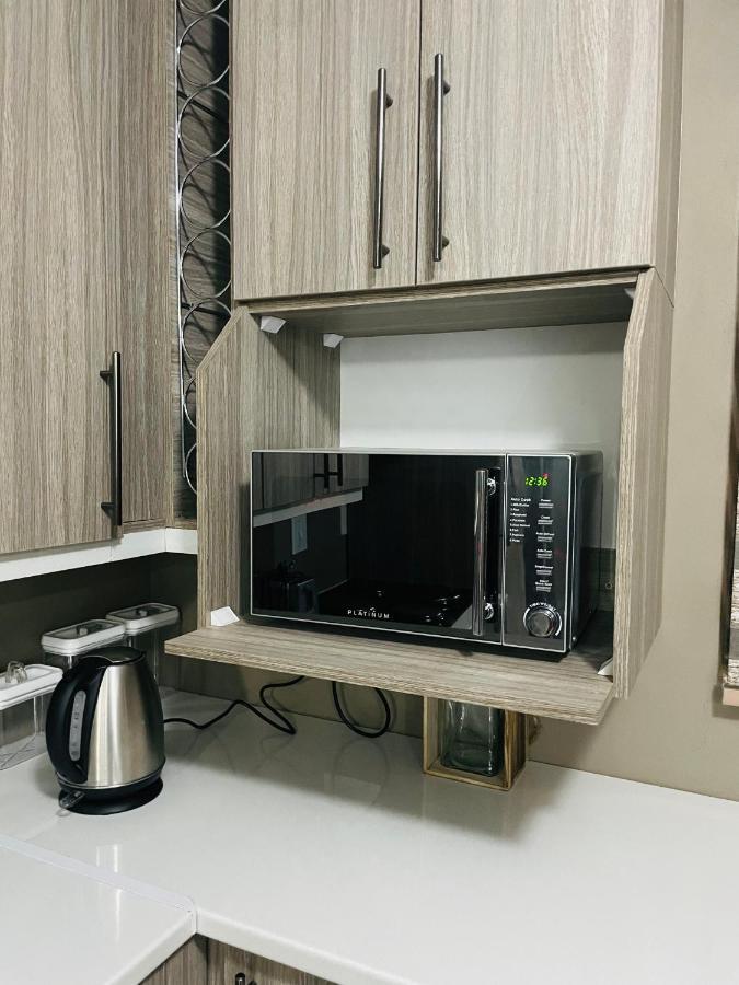 Moh Ville Guest House Масеру Екстериор снимка