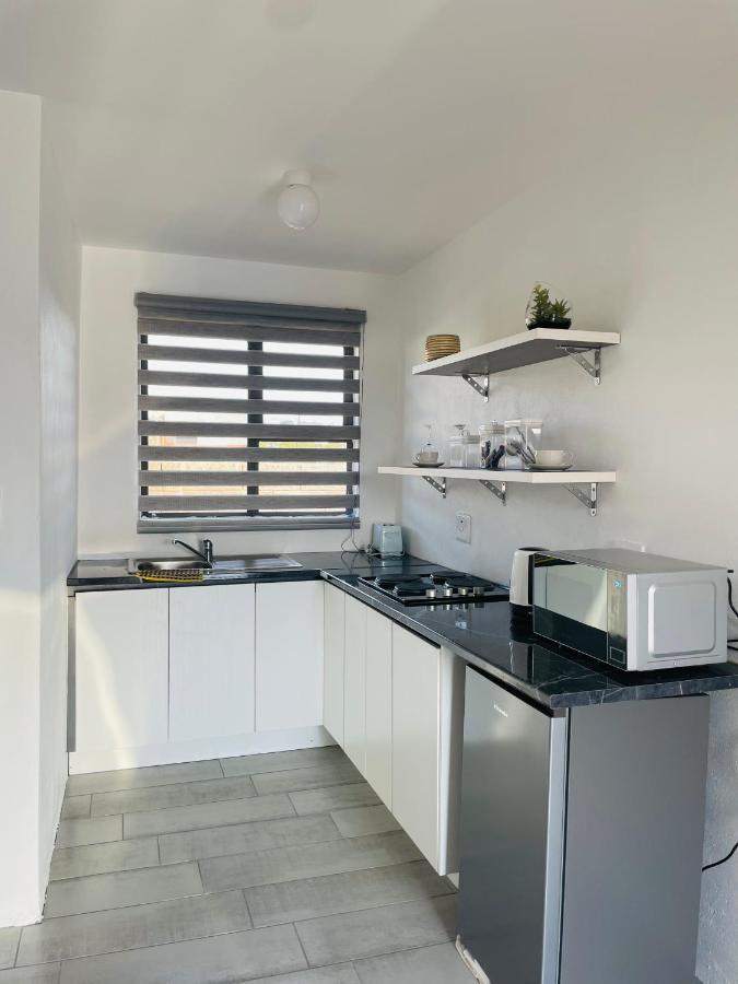 Moh Ville Guest House Масеру Екстериор снимка