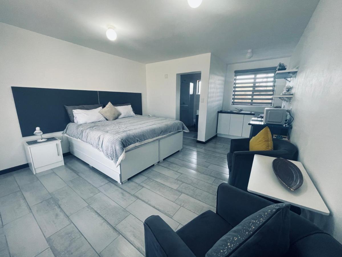 Moh Ville Guest House Масеру Екстериор снимка