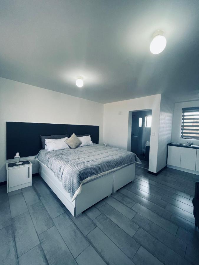 Moh Ville Guest House Масеру Екстериор снимка