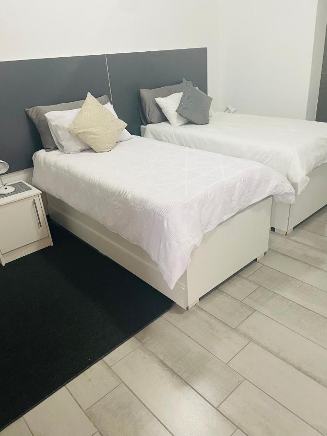 Moh Ville Guest House Масеру Екстериор снимка