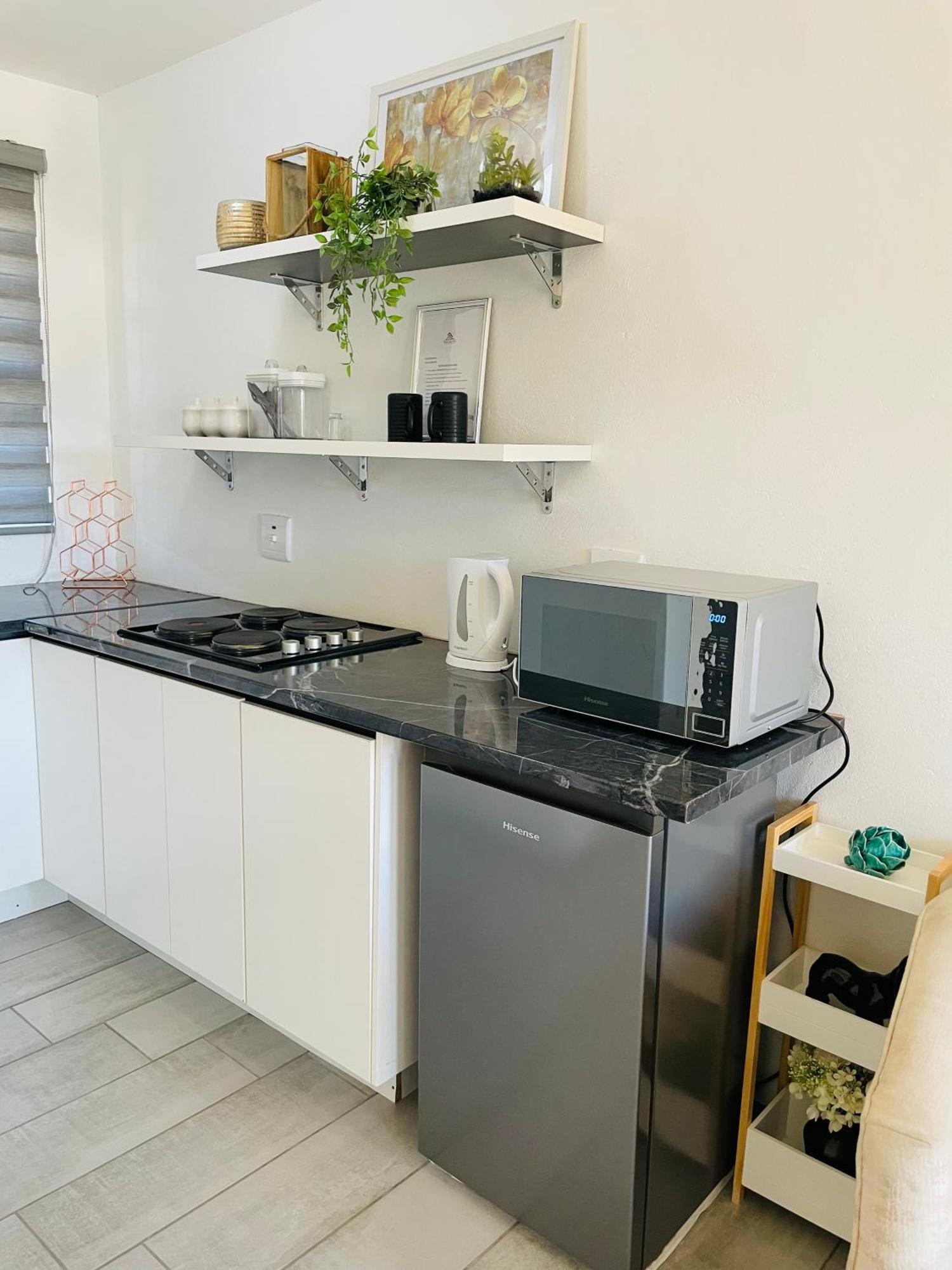 Moh Ville Guest House Масеру Екстериор снимка
